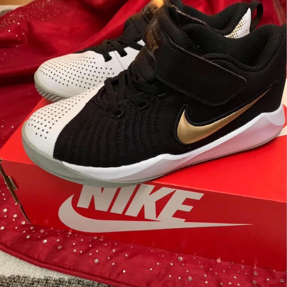 Nike Black and Gold Sneakers with Breathable Knit Fabric